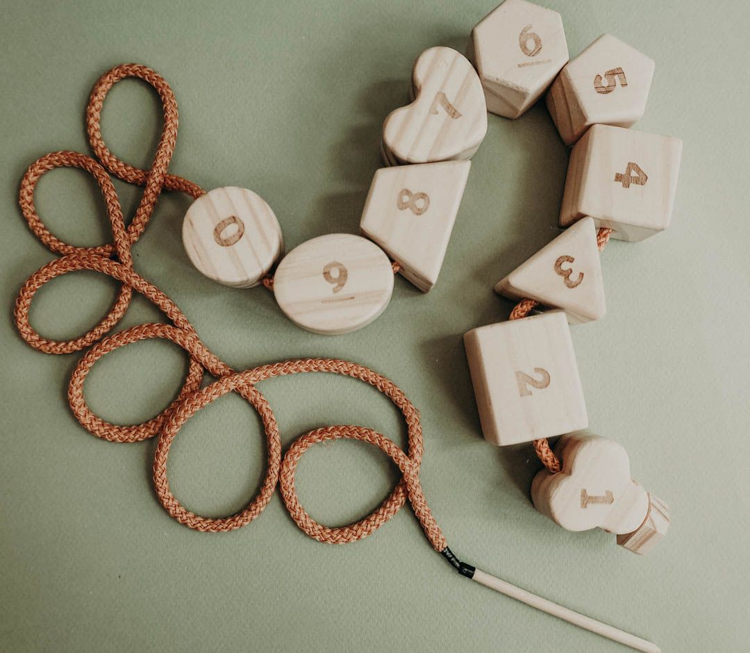 Wooden lacing toy with numbers and geometry shapes - Kidtoycart